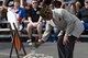 Retired U.S. Air Force Master Sgt. Ernest Richardson, a member of the Veterans of Foreign War Post 9555, places a flower during a Memorial Day ceremony