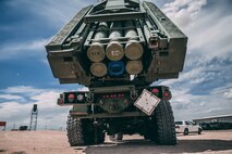 Marines with 5th Battalion, 11th Marine Regiment, 1st Marine Division, arrive at one of their launch positions with the High-Mobility Artillery Rocket System at the Air Combat Element landing strip as a part of Integrated Training Exercise 3-18 aboard the Marine Corps Air Ground Combat Center, Twentynine Palms, Calif., May 21, 2018. The purpose of ITX is to create a challenging, realistic training environment that produces combat-ready forces capable of operating as an integrated MAGTF. (U.S. Marine Corps photo by Lance Cpl. William Chockey)
