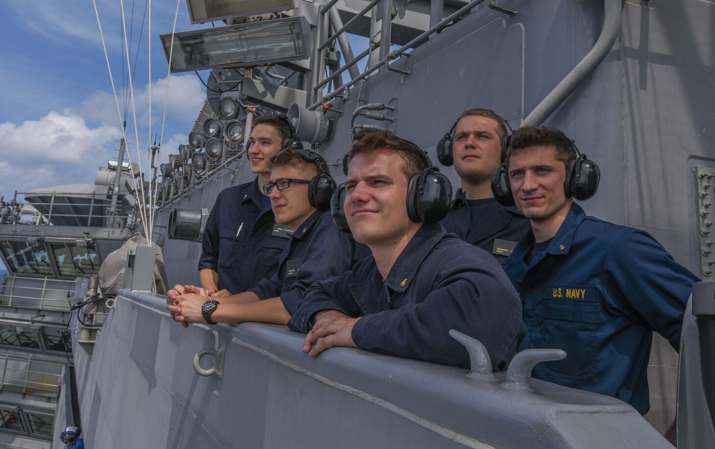 Midshipmen observe flight operations on the Navy's forward-deployed aircraft carrier, USS Ronald Reagan (CVN 76), during their summer cruise. Ronald Reagan, the flagship of Carrier Strike Group 5, provides a combat-ready force that protects and defends the collective maritime interests of its allies and partners in the Indo-Pacific region.