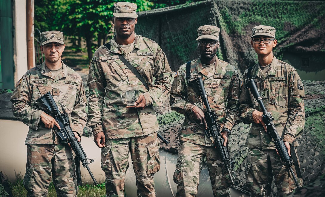 Sgt. Daniel Baudoin, Pvt. Oshane Williams, Pvt. Duy Nguyen and Spc. Casey Reid