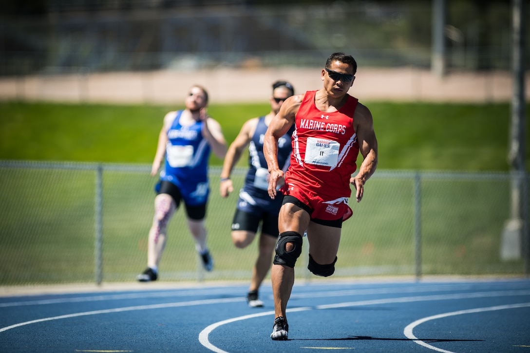 U.S. Marine Corps Capt. Phal It, a native of Bronx, New York, competes in the 2018 DoD Warrior Games Track Competition at the U.S. Air Force Academy in Colorado Springs, Colorado, June 2, 2018. The Warrior Games is an adaptive sports competition for wounded, ill and injured service members and veterans. Approximately 300 athletes representing teams from the Marine Corps, Navy, Army, Air Force, Special Operations Command, United Kingdom Armed Forces, Canadian Armed Forces, and the Australian Defence Force will compete June 1 - June 9 in archery, cycling, track, field, shooting, sitting volleyball, swimming, wheelchair basketball, and - new this year - powerlifting and indoor rowing.