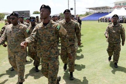 Royal Bahamas Defence Force members march.