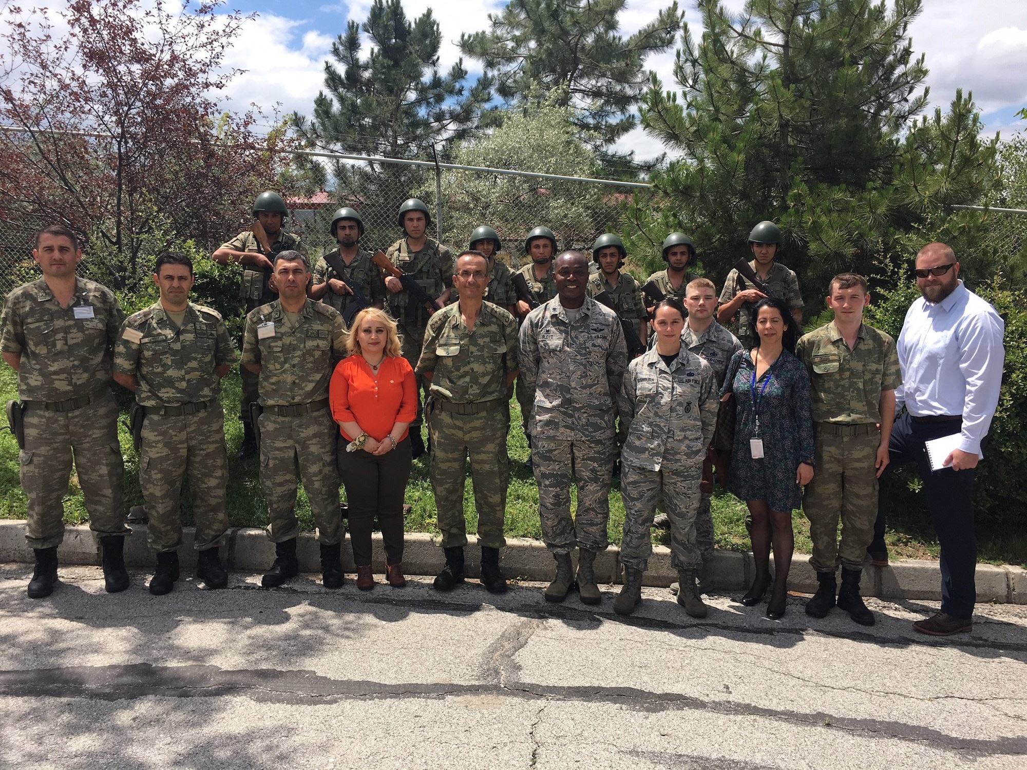 U.S. Air Force members of the 717th Air Base Squadron pose for a photo with Turkish Education and Doctrine Base Mission Support Group commander and his troops, after a joint security exercise at Ankara, Turkey, June 1, 2018.