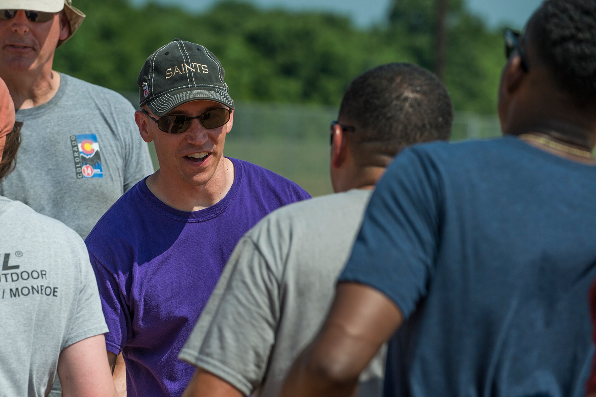 U.S. Air Force Lt. Col. George Cole III shakes hands with Airmen assigned to the 307th Maintenance Squadron (MXS) munitions section after a softball game on June 2, 2018, Barksdale AFB, La. Cole is the commander of the 307th MXS and will be relinguishing command of the squadron in July. (U.S. Air Force photo by Master Sgt. Greg Steele/Released)