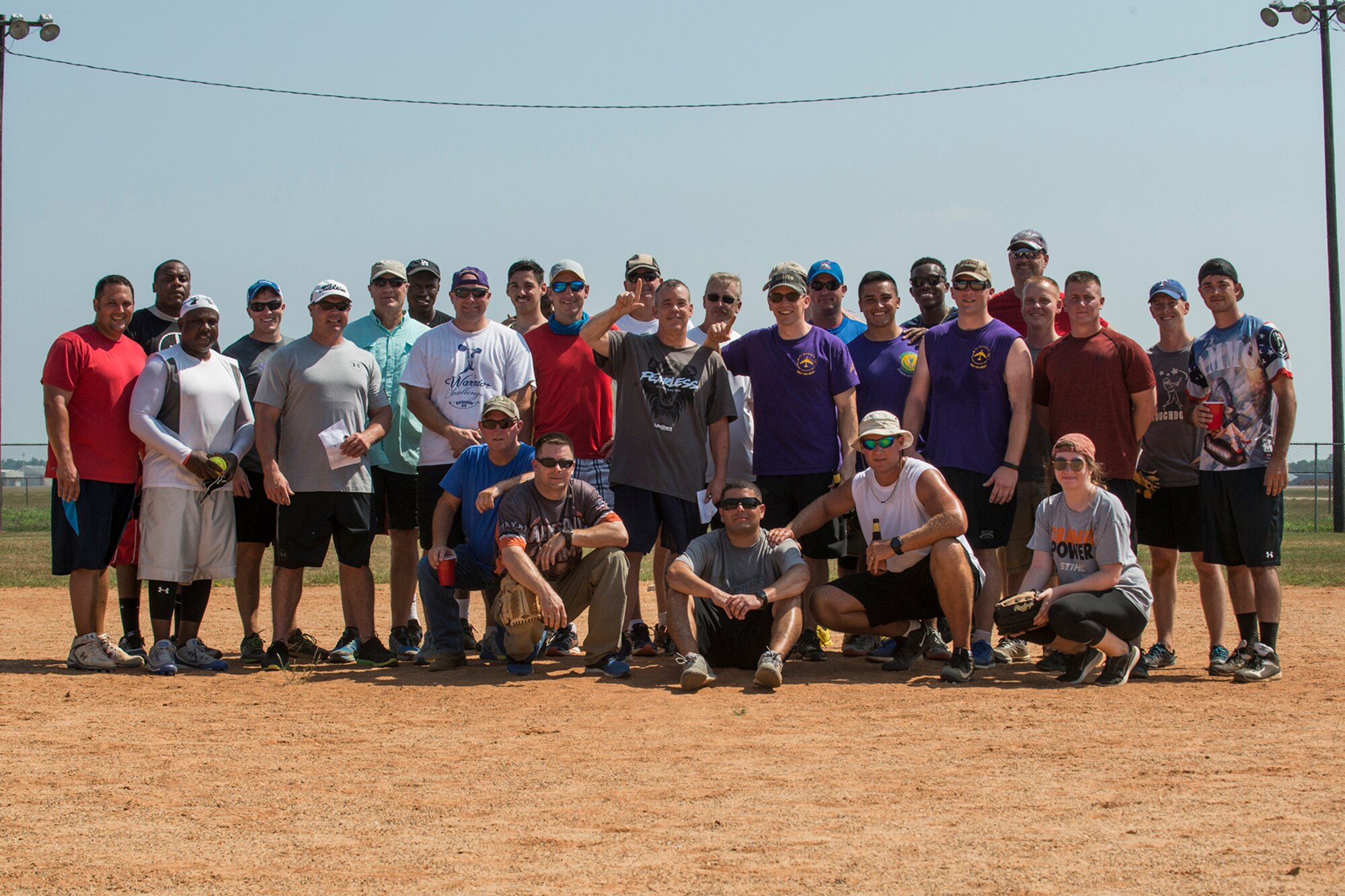 Members of the 307th Maintenance Squadron take a group photo following a softball game held on the 307th Bomb Wing’s Unit Training Assembly weekend, June 2, 2018, Barksdale AFB, La. The game pitted Airmen from the muntions section against the maintainers. (U.S. Air Force photo by Master Sgt. Greg Steele/Released)