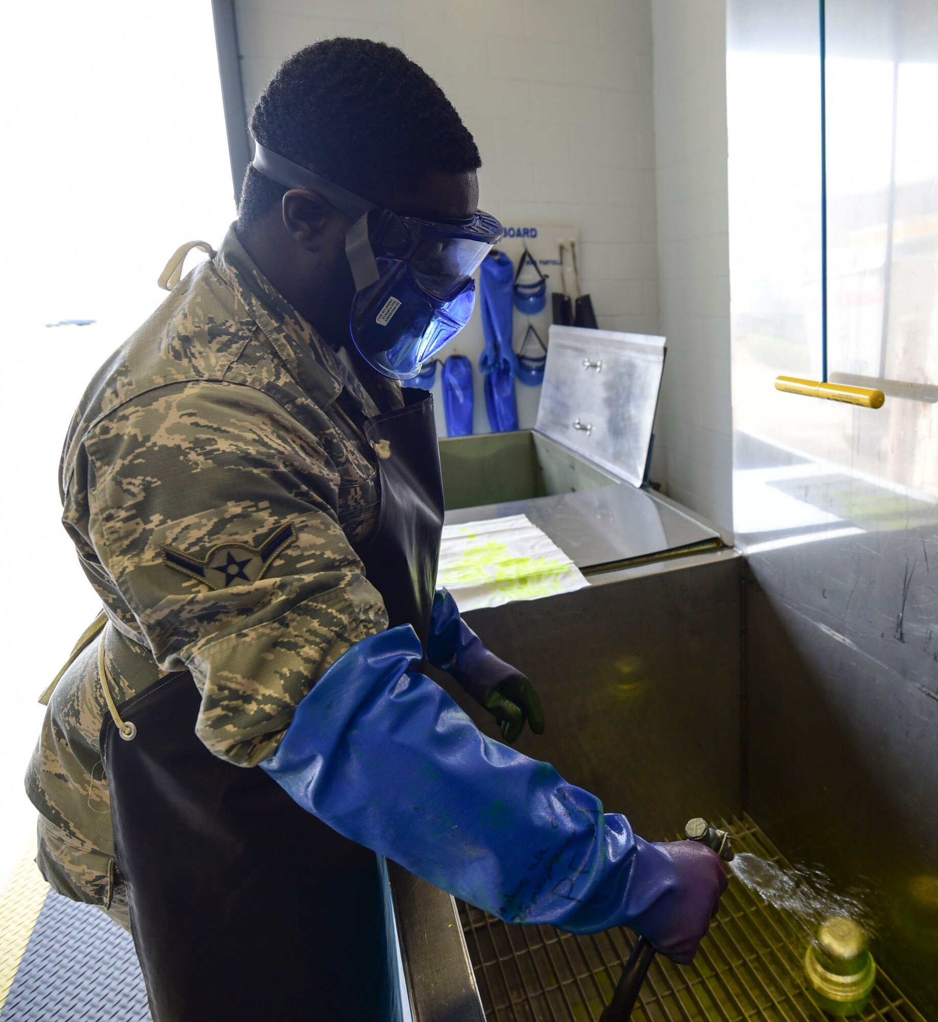A U.S. Air Force nondestructive inspection specialist from the 325th Maintenance Squadron identifies cracks and stresses in components and equipment at Tyndall Air Force Base, Fla, May 23, 2018. Nondestructive inspection specialists are responsible for employing noninvasive methods to inspect the insides of metal objects and identifying possible defects in systems and equipment to prevent accidents. (U.S. Air Force photo by Senior Airman Cody R. Miller/Released)