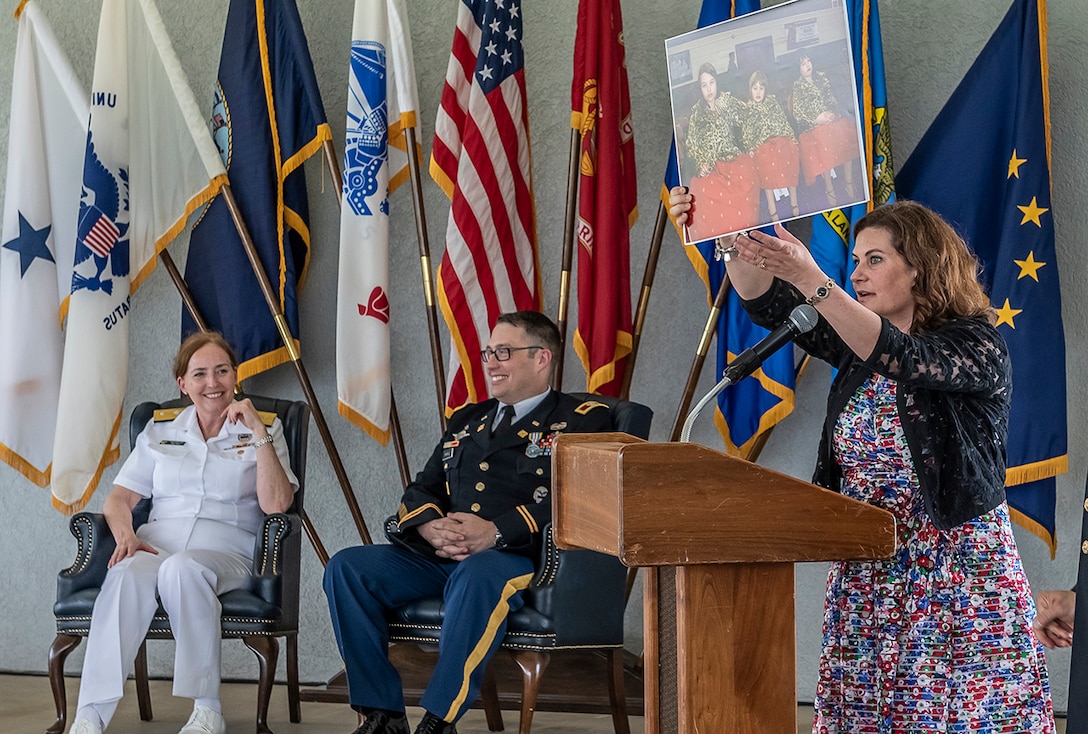 Kristen Farrand, wife of retiring Army Col. Dale Farrand, speaks at his retirement ceremony May 31