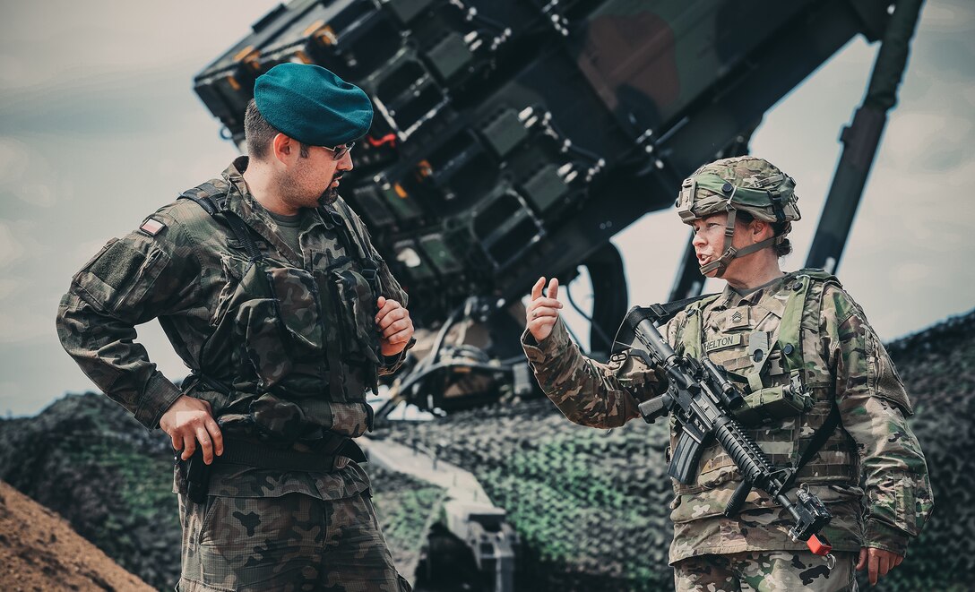 Cpt. Grzegorz Piskiewcz, the air defense officer, 12th Mechanized Division Headquarters, and Sgt. 1st Class Paige Shelton