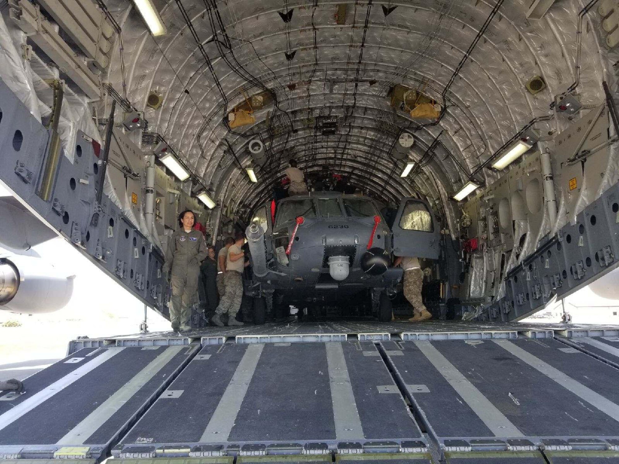 Reserve Citizen Airmen from the 920th Aircraft Maintenance Squadron at Patrick AFB, Fla. load an HH-60G Pave Hawk onto a C-17 as part of Red Flag-Rescue 18-2 near Davis-Monthan Air Force Base, Ariz., on May 3, 2018. Red Flag-Rescue gives joint service personnel an opportunity to build fundamental combat search and rescue skills to fight in and out of contested environments. (U.S. Air Force photo by Capt. Jonathan Foster)