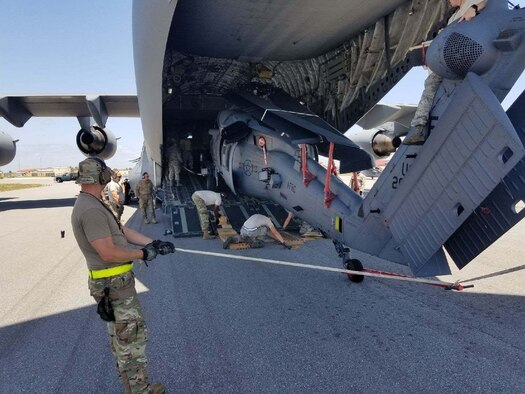 Reserve Citizen Airmen from the 920th Aircraft Maintenance Squadron at Patrick AFB, Fla. load an HH-60G Pave Hawk onto a C-17 as part of Red Flag-Rescue 18-2 near Davis-Monthan Air Force Base, Ariz., on May 3, 2018. Red Flag-Rescue gives joint service personnel an opportunity to build fundamental combat search and rescue skills to fight in and out of contested environments. (U.S. Air Force photo by Capt. Jonathan Foster)