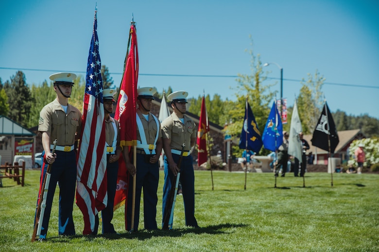 A Marine Corps Color Guard from Marine Corps Logistics Base Barstow, Calif., stands at parade rest during a Memorial Day ceremony held in Big Bear Lake, Calif., May 28, 2018. The ceremony was hosted by the American Legion and Marine Corps League and presented multiple guest speakers with backgrounds in the military. (U.S. Marine Corps photo by Lance Cpl. Isaac Cantrell)