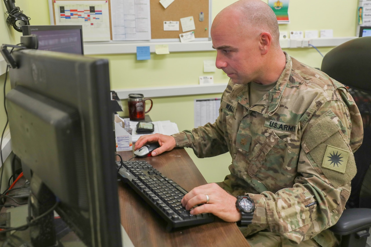 Checking email at Kandahar Airfield, Afghanistan