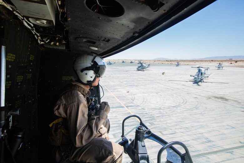 A crew with Light Attack Helicopter Squadron 367, also known as ‘Scarface’  leaves the flight line in a UH-1Y Venom Utility helicopter for a flight mission during the Final Exercise of Integrated Training Exercise 3-18 aboard the Marine Corps Air Ground Combat Center, Twentynine Palms, Calif., May 23, 2018. Marine aviation provides the Marines of the Marine Air Ground Task Force the operational flexibility it needs to accomplish their mission. (U.S. Marine Corps photo by Lance Cpl. Dave Flores)