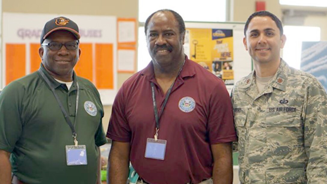 On April 28, Willie Anderson, Michael Abernathy and Air Force Maj. Alvin Otero, volunteered to talk to middle and high school students during the STEM Revolution held at Evans High School in Orlando. The three volunteers are a part of the Defense Contract Management Agency Lockheed Martin Orlando. (Photo taken by Michael Felix)