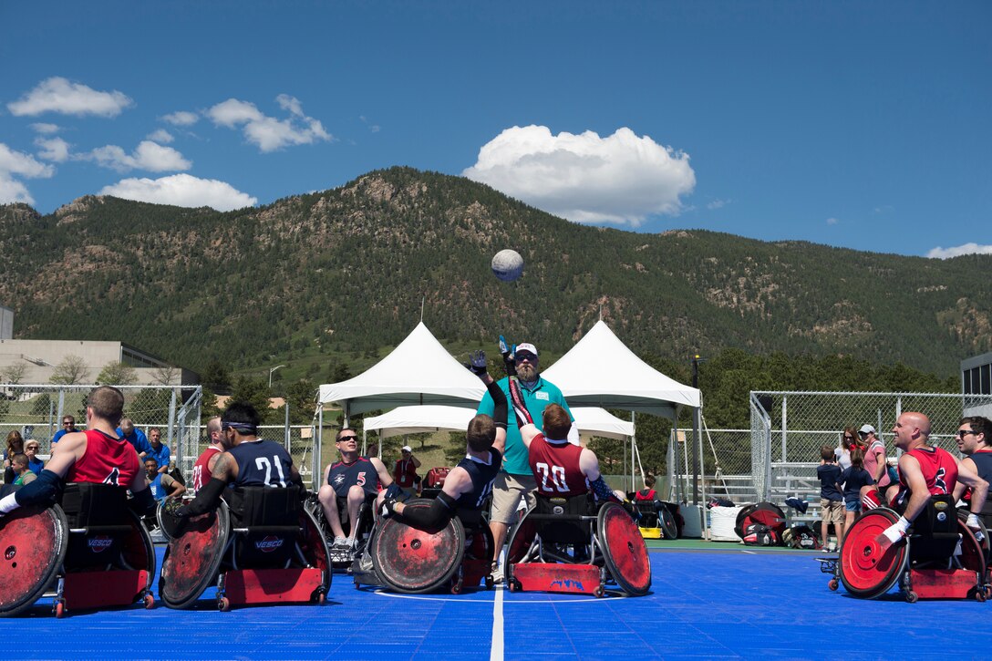 Wheelchair rugby players, including two from Team USA, began an exhibition match.