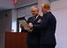 Maj. Gen. John Howlett, United States Air Force, retired, and Col. James Kellogg, Jr., 94th Airlift Wing vice commander, hold Kellogg’s certificate of retirement at Dobbins Air Reserve Base, Ga, June 2, 2018. Howlett attended Kellogg’s retirement ceremony as the presiding official, and talked about his time with Kellogg. (U.S. Air Force photo by Staff Sgt. Miles Wilson)