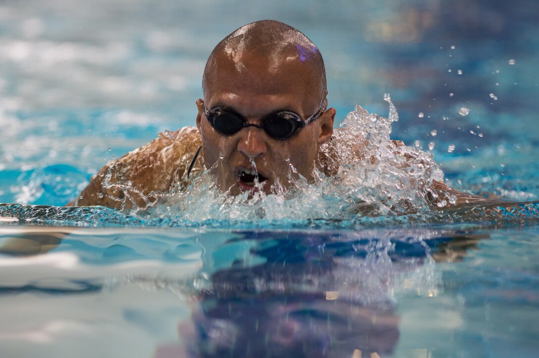 U.S. Marine Corps Gunnery Sgt. Dorian Gardner, a native of Rialto, California, participates in a 2018 DoD Warrior Games swim practice at the U.S. Air Force Academy in Colorado Springs, Colorado, June 4, 2018. The Warrior Games is an adaptive sports competition for wounded, ill and injured service members and veterans. Approximately 300 athletes representing teams from the Marine Corps, Navy, Army, Air Force, Special Operations Command, United Kingdom Armed Forces, Canadian Armed Forces, and the Australian Defence Force will compete June 1 - June 9 in archery, cycling, track, field, shooting, sitting volleyball, swimming, wheelchair basketball, and - new this year - powerlifting and indoor rowing.