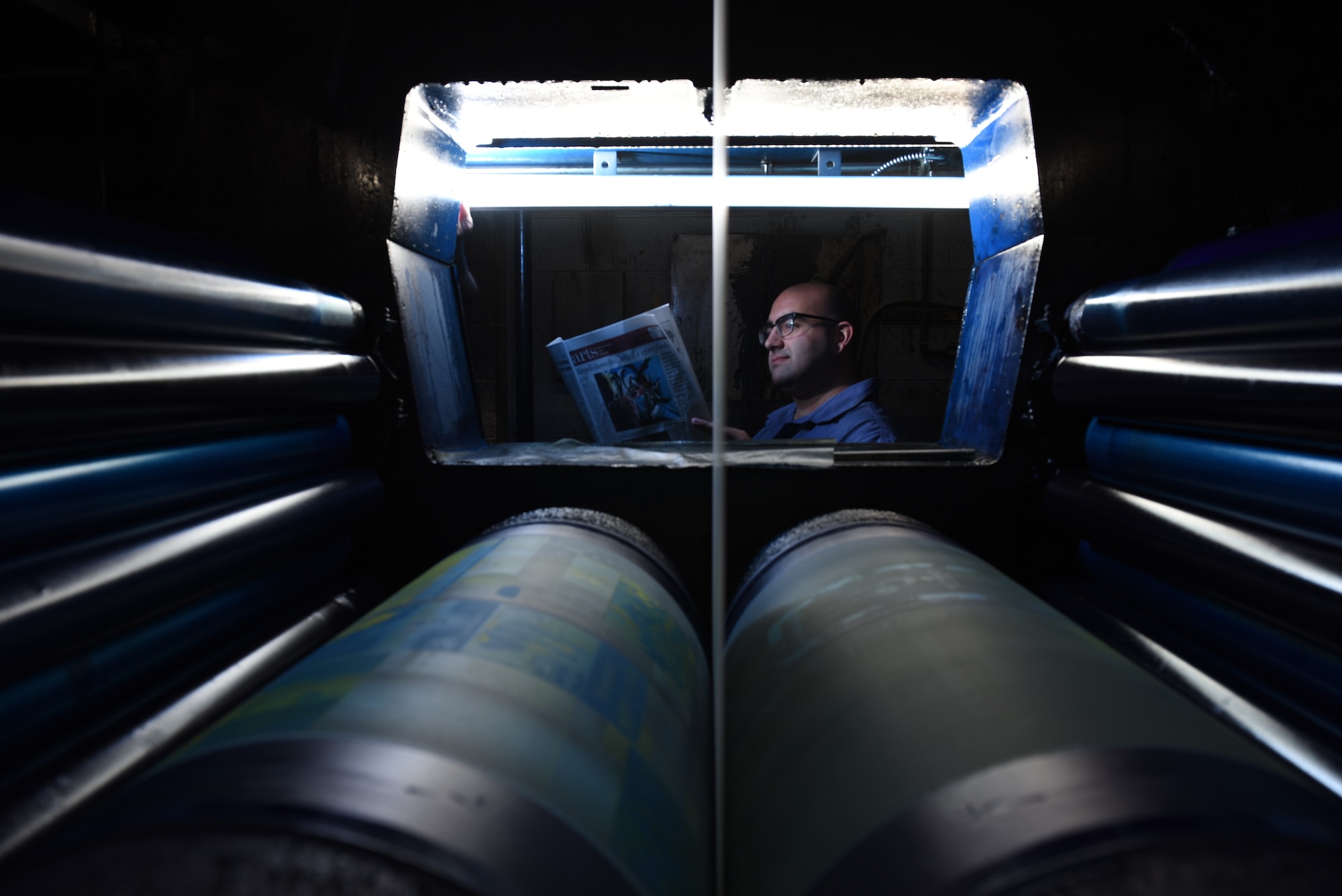 Nick DeCicco, Tailwind editor, poses for a photo May 4, 2018, at the Daily Republic Newspaper Office in Fairfield, Calif. DeCicco works at the Daily Republic, which houses the printing press where the Tailwind is printed. (U.S. Air Force photo by Staff Sgt. Amber Carter/Airman 1st Class Amy Younger)