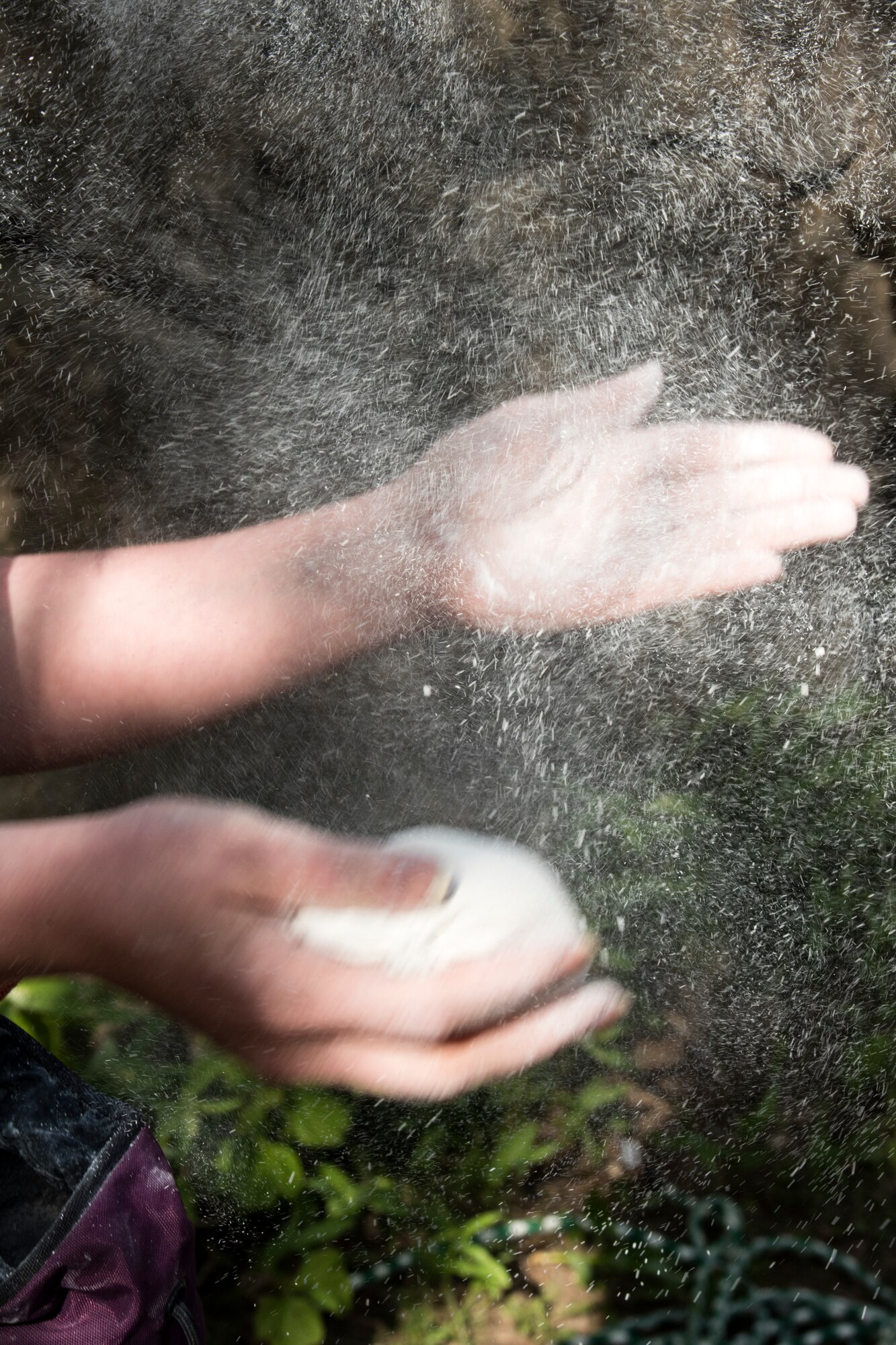 Gwen Nieberlein, a 673d Medical Group Family Advocacy Outreach Manager, chalks her hands during an Outdoor Adventure Program rock-climbing trip at Pivot Point Trail near Anchorage, Alaska, May 31, 2018. Nieberlein has participated in many of OAP’s guided events since being stationed at Joint Base Elmendorf-Richardson. The OAP offers many opportunities year-round for the JBER community to explore Alaska while also supporting the development of mission-ready military families and members.