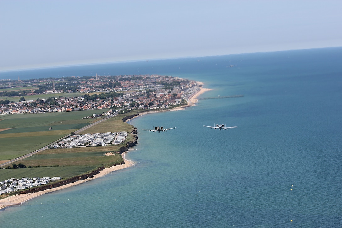A squadron flies over Normandy, France as part of the commemoration ceremonies for D-Day.