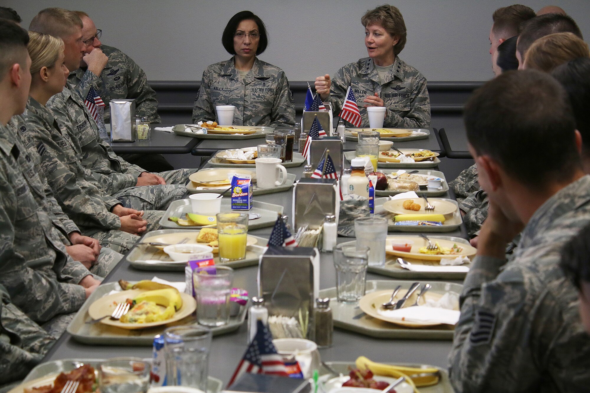 Lt. Gen. Maryanne Miller, Air Force Reserve Command commander and Chief of the Air Force Reserve, and Chief Master Sgt. Ericka Kelly, AFRC command chief, talk with 445th Airlift Wing Airmen during breakfast at the Pitsenbarger Dining Facility May 5, 2018