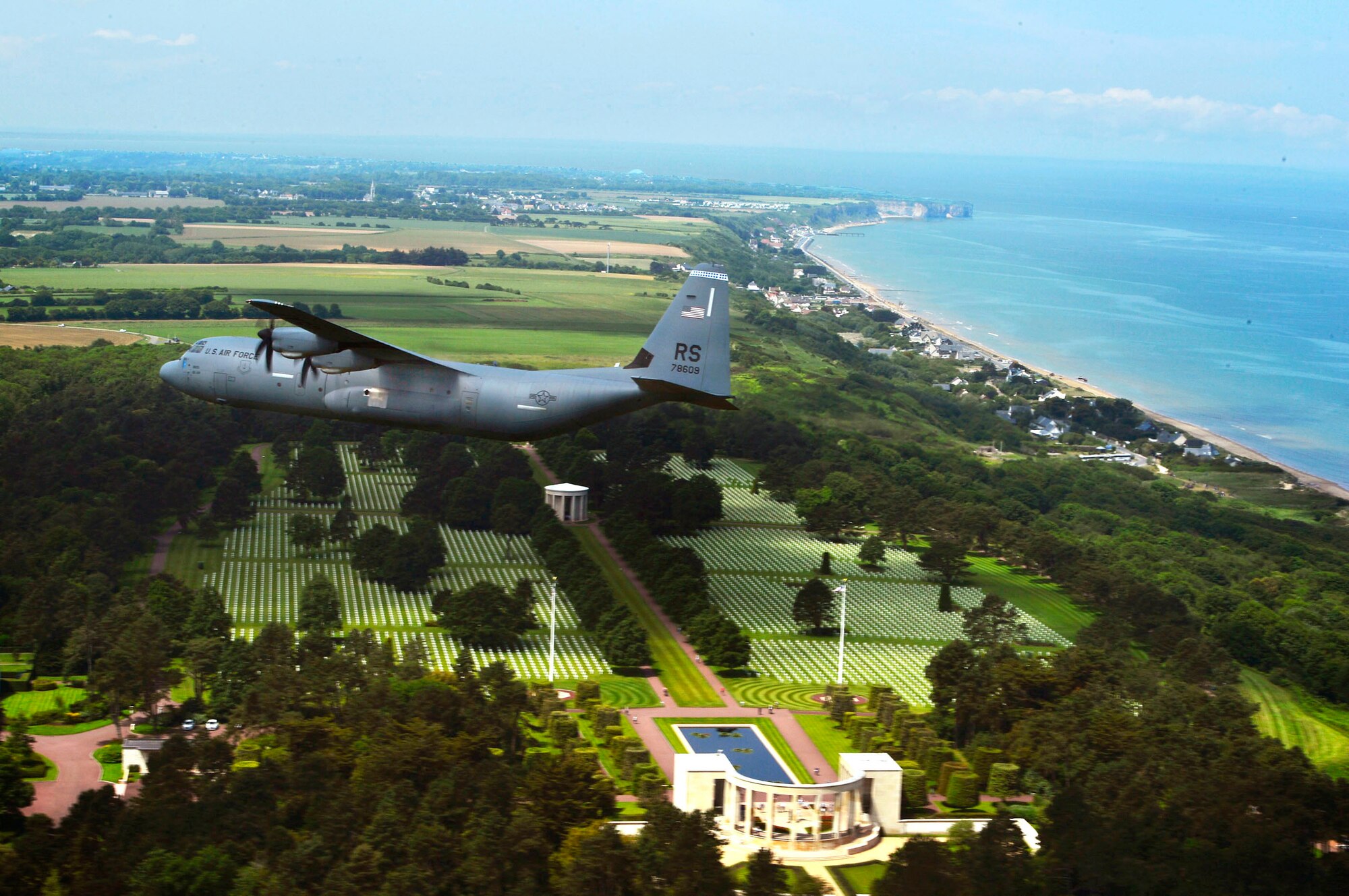 Paratroopers descend upon Sainte-Mère-Église, France, June 3, 2018. The D-Day memorial airdrops involved paratroopers from the U.S. Army and other Allied nations. (U.S. Air Force photo by Senior Airman Joshua Magbanua)