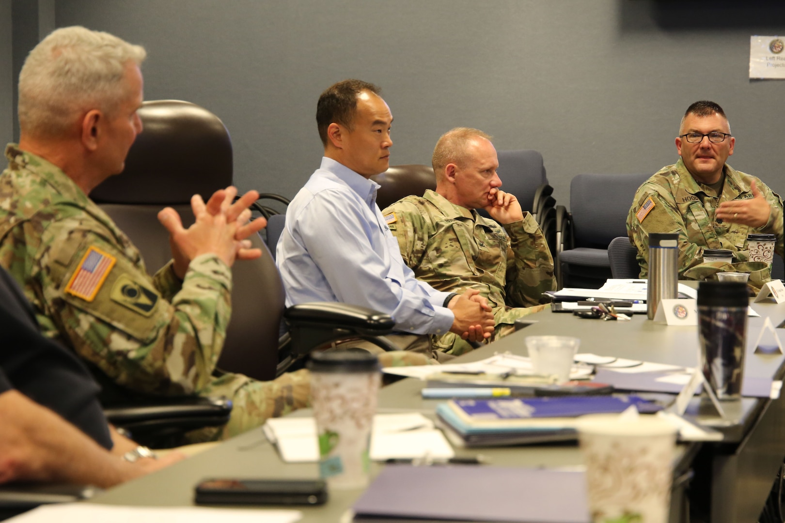 Army Maj. Gen. Richard Gallant, left, discusses response scenarios with attendees at the Joint Task Force Civil Support (JTF-CS) table top exercise May 15-16. More than 50 people from the Chemical, Biological, Radiological and Nuclear (CBRN) Response Enterprise (CRE) gathered here to rehearse responding to complex catastrophic disasters in the United States and its territories. JTF-CS provides command and control for designated Department of Defense specialized response forces to assist local, state, federal and tribal partners in saving lives, preventing further injury, and providing critical support to enable community recovery.  (Official Department of Defense photo by Mass Communication Specialist 3rd Class Michael Redd)