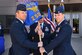SCHRIEVER AIR FORCE BASE, Colo. – Col. Toby Doran, commander of the 50th Operations Group, passes the 2nd Space Operations Squadron guidon to Lt. Col. Stephen Toth, incoming commander of the 2nd SOPS, during a change of command ceremony at Schriever Air Force Base, Colorado, June 1, 2018. Toth is the new commander of 2nd SOPS after having served as the chief of standardization and evaluation for the 50th OG. (U.S. Air Force photo by Dennis Rogers)