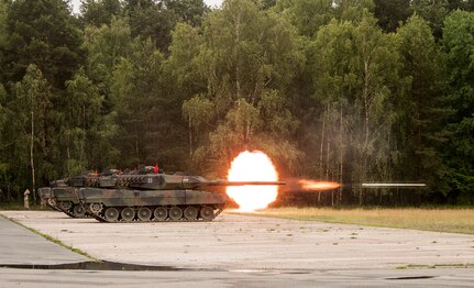 A German Leopard 2A6 tank fires