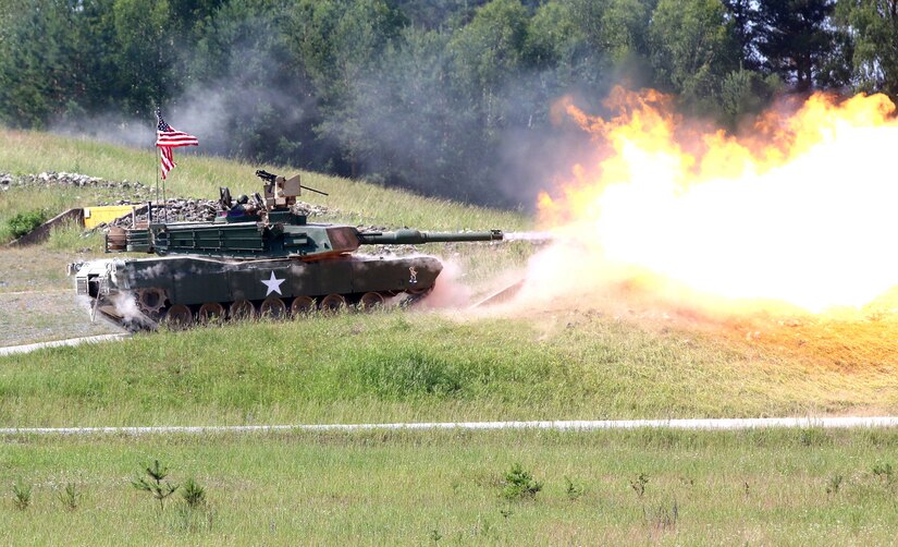 A tank from the 2nd Battalion, 70th Armor Regiment, 2nd Armored Brigade Combat Team, 1st Infantry Division fires