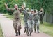 U.S. service members head for the finish line during the Third Annual Chief Master Sgt. of the Air Force Paul Airey Memorial Ruck/March/Run on Ramstein Air Base, Germany, June 1, 2018. After crashing his aircraft behind enemy lines and becoming a prisoner of war, Airey and other POWs were forced to march approximately 400 miles across Germany, after which Airey was eventually rescued. The memorial events were designed to honor Airey and his resiliency during his time as a POW. (U.S. Air Force photo by Senior Airman Elizabeth Baker)