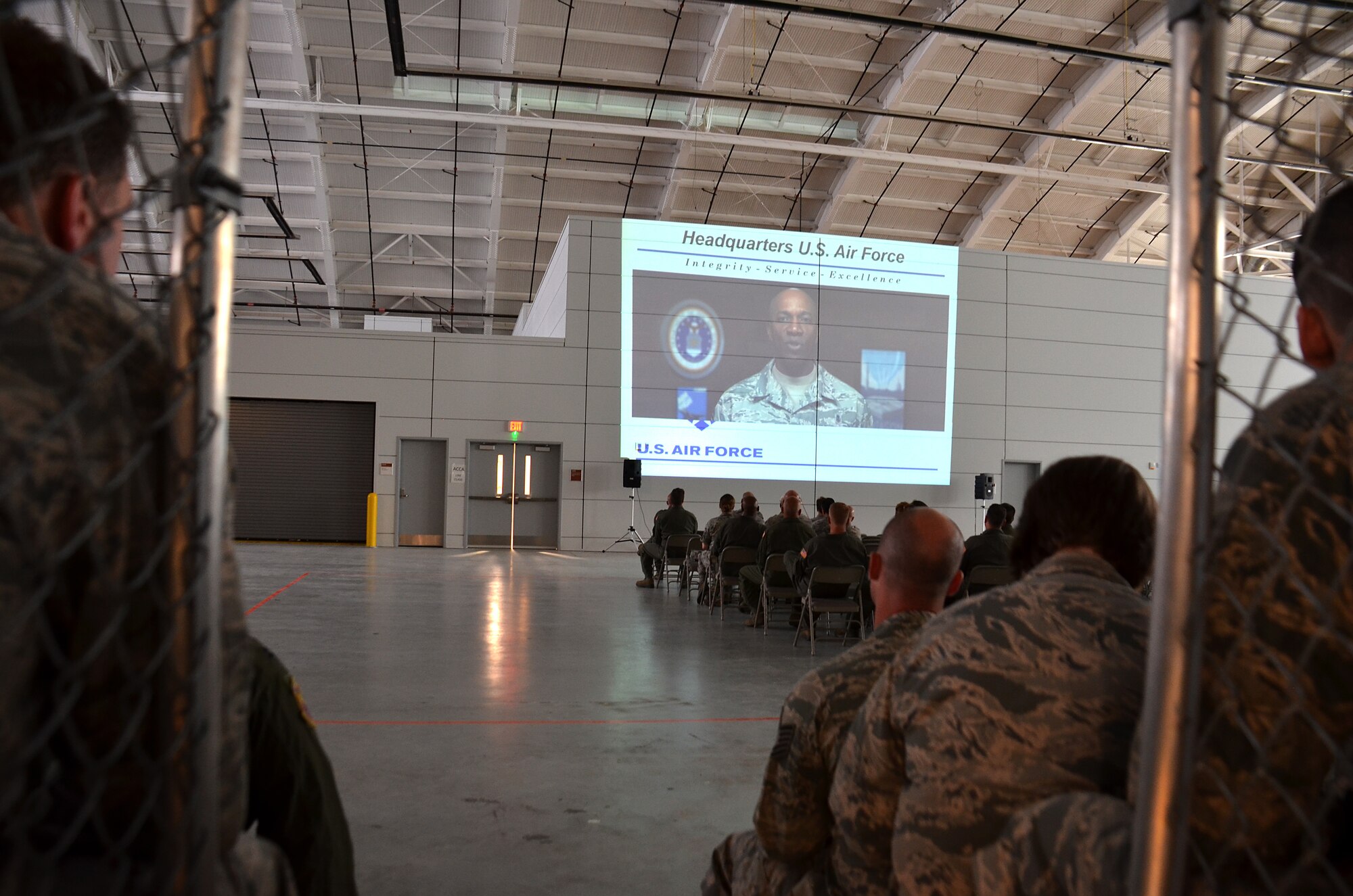 Airmen from the 439th Airlift Wing view a recorded briefing from Chief Master Sgt. of the Air Force, Kaleth O. Wright, during the wing-wide safety review. The safety review, held due to a recent string of Air Force accidents, continued into Monday with the civilian workforce at Westover.