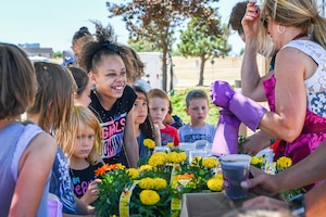 SCHRIEVER AIR FORCE BASE, Colo. – Children from the Child Development Center participate in activities during the 50th Force Support Squadron 1st anniversary celebration of the Event Center at Schriever Air Force Base, Colorado, June 1, 2018. The event featured new campers and other items for loan and rent from the Outdoor Recreation Office for the summer. Army and Air Force Exchange Service food vendors and other services also provided support for the event. (U.S. Air Force photo by Kathryn Calvert)