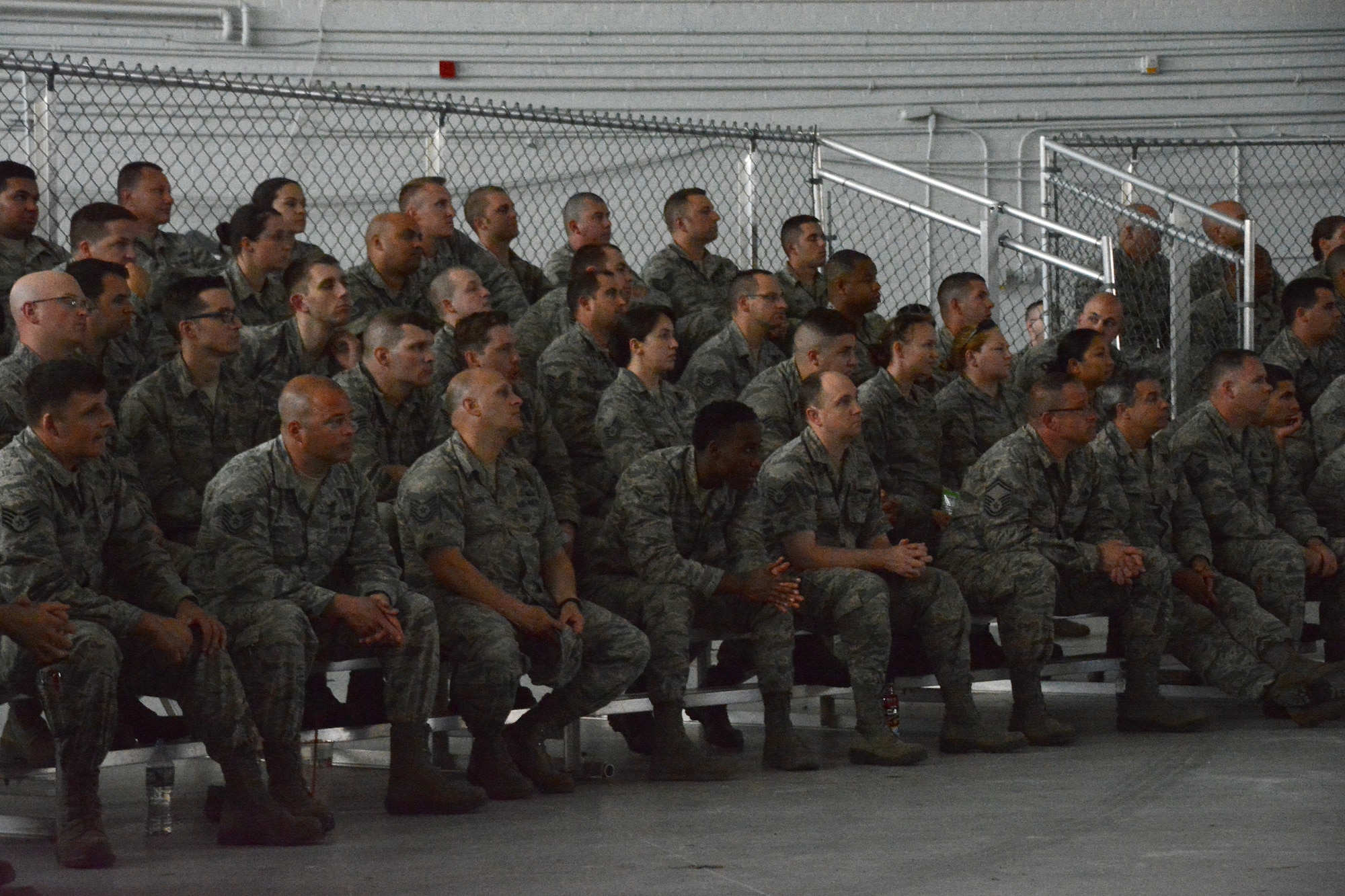 Airmen attend a safety review in the 439th Airlift Wing's base hangar. The safety review, held due to a recent string of Air Force accidents, continued into Monday with the civilian workforce at Westover.