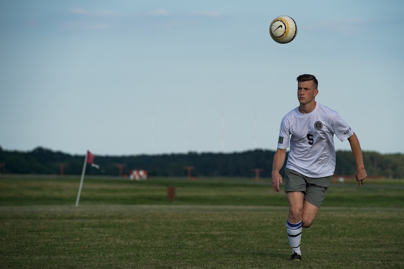 Ryan Andrews, 633rd Medical Group team defender, runs to the ball during the Intramural Soccer Championship at Joint Base Langley-Eustis, Virginia, June 4, 2018.