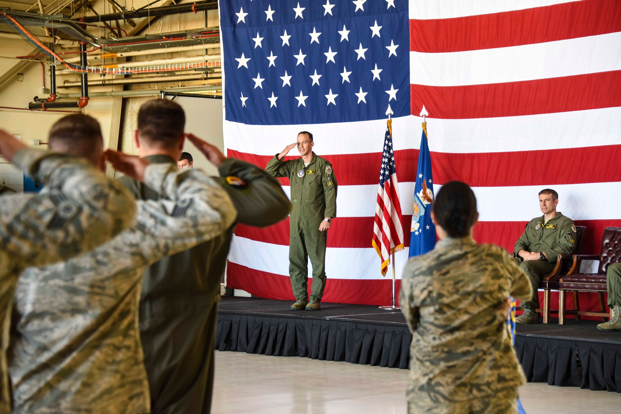 Lt. Col. Benjamin Harrison receives his first salute as commander from members of the 466th Fighter Squadron