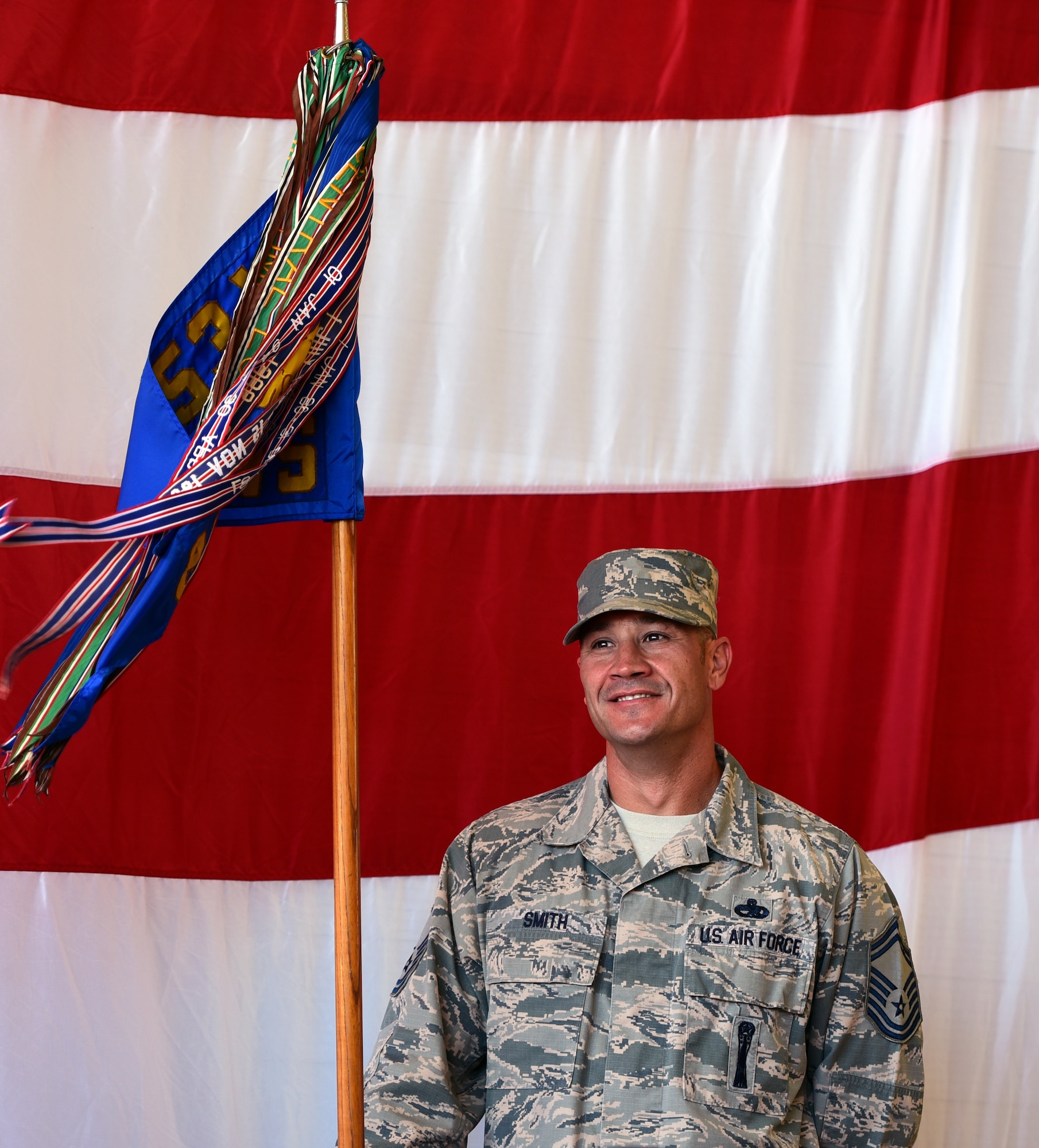 U.S. Air Force Senior Master Sgt. Timothy Smith, 83rd Fighter Weapons Squadron superintendent, stands holding the ceremonial guidon moments before the 83rd FWS change of command ceremony at Tyndall Air Force Base, Fla., May 24, 2018. The 83rd FWS is responsible for evaluating tactical fighter weapons systems within the U.S. Air Force air-to-air weapons systems evaluation program. (U.S. Air Force photo by Airman 1st Class Isaiah J. Soliz/Released)