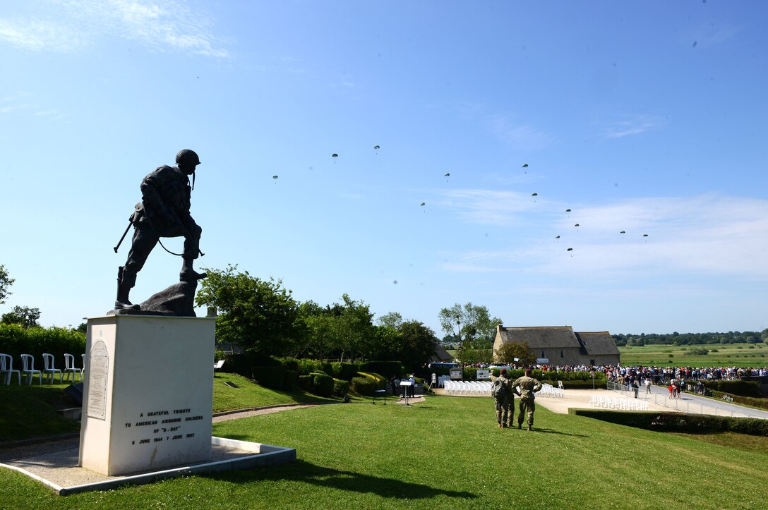 Paratroopers descend upon Sainte-Mère-Église, France, June 3, 2018. The D-Day memorial airdrops involved paratroopers from the U.S. Army and other Allied nations. (U.S. Air Force photo by Senior Airman Joshua Magbanua)