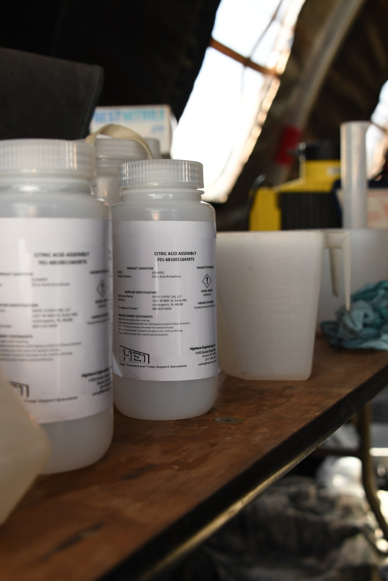 Chemicals sit on a table used by the 319th Civil Engineer Squadron water fuels system maintenance Airmen during a training on Fargo Air National Guard Base, North Dakota, June 1, 2018. The variety of chemicals each have a different job, according to Master Sgt. John Kimble, prime base engineer emergency force manager, who says the citric acid assembly is used to balance the pH of water in order to make it safer to drink. (U.S. Air Force photo by Airman 1st Class Elora J. Martinez)