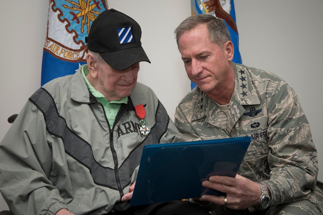CSAF presents French medal to WWII Army vet, AF civilian
