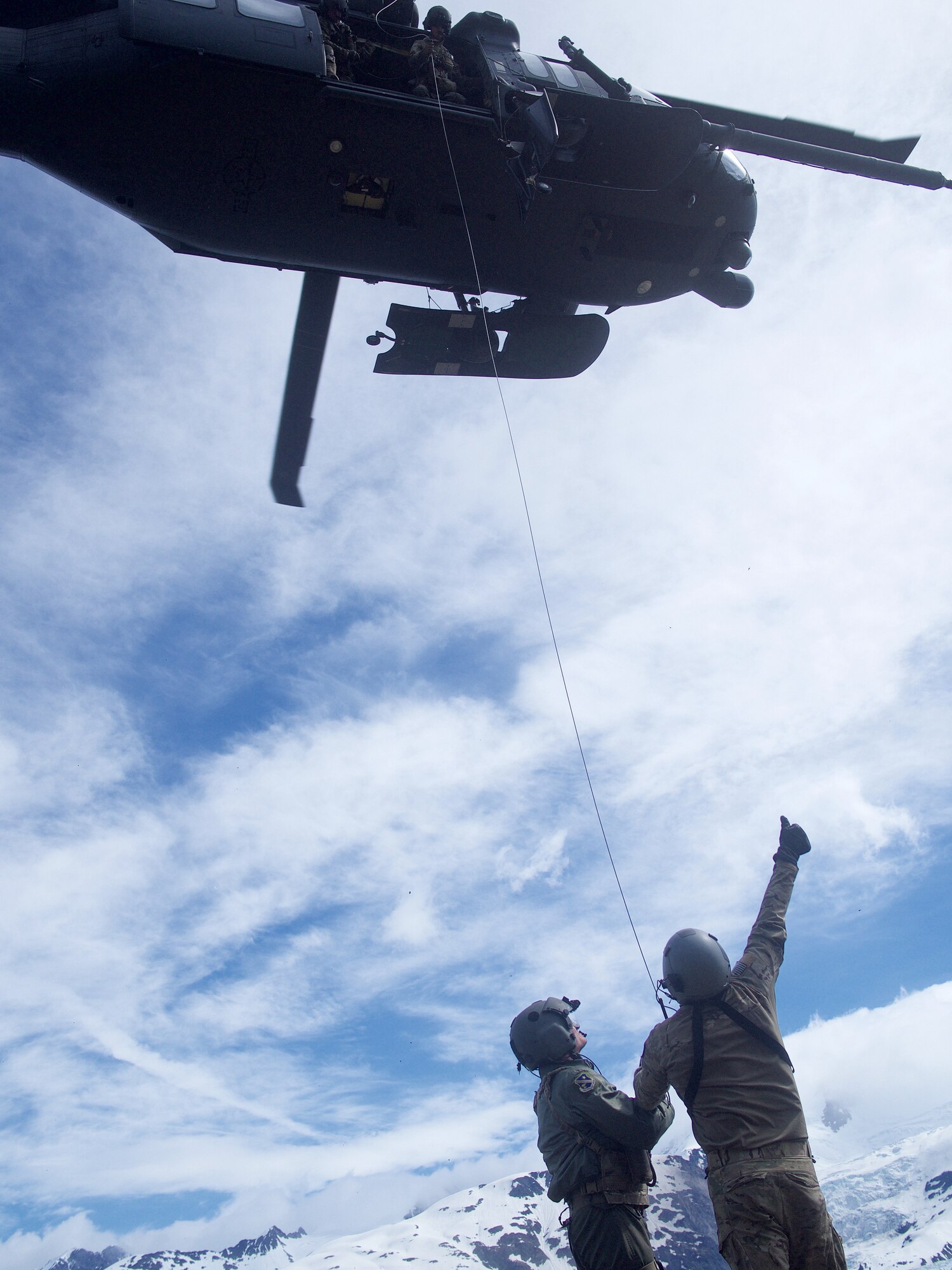 Chief Master Sgt. Lance Jordan flies with Pave Hawk crew for fini flight.