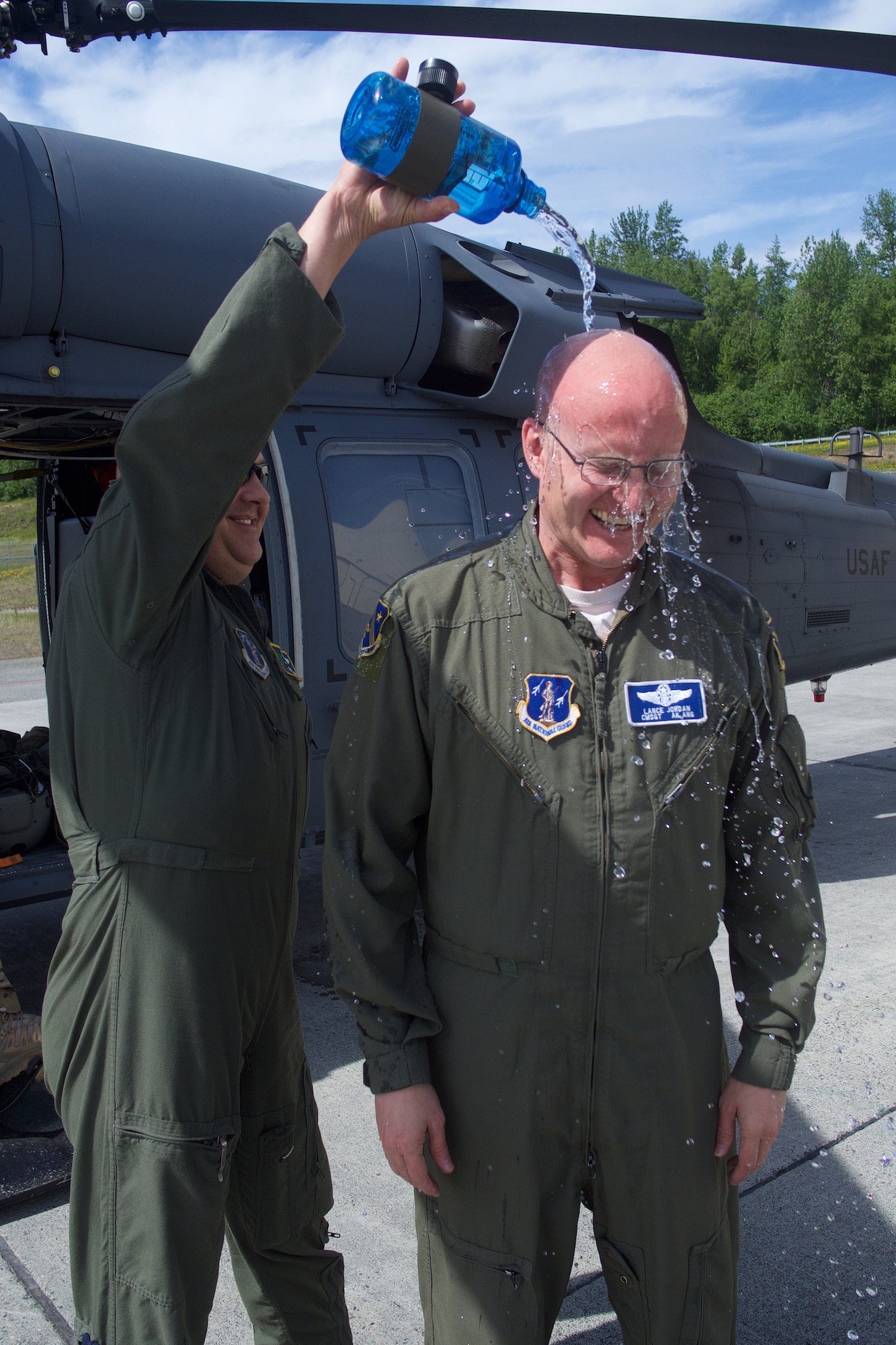 Chief Master Sgt. Lance Jordan flies with Pave Hawk crew for fini flight.