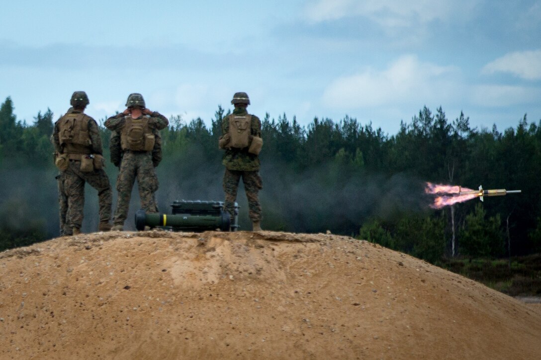 U.S. Marines with Black Sea Rotational Force 18.1 fire a TOW wire-guided missile during Exercise Saber Strike 18 on Adazi Military Base, Latvia, June 4, 2018. Exercise Saber Strike is an integrated field training exercise that occurs annually throughout Estonia, Latvia, Lithuania and Poland, increasing joint operational capability and enhancing the NATO alliance. (U.S. Marine Corps photo by Lance Cpl. Angel D. Travis)