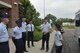 Lt. Gen. Robert McMurry (center) commander of the Air Force Life Cycle Management Center and Chief Master Sgt. Michelle Thorsteinson-Richards (right) AFLCMC command chief, talk with Airmen from the Air Force Metrology and Calibration program. McMurry visited AFMETCAL to meet with employees, tour work sections and hold an All Call. (U.S. Air Force photo / Brian Brackens