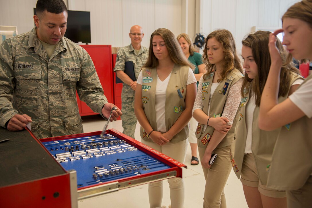 Tech. Sgt. Armando Gutierrez, 934th Maintenance Squadron propulsion technician, shows the contents of a tool box to Girl Scouts from troop 25258 and 25408 during a tour of the 934th MXS at Minneapolis Air Reserve Station, Minn., June 2, 2018. Gutierrez explained the importance of accountability to the girls and how it is tied into the Air Force core values. (U.S. Air Force Photo by Tech. Sgt. Amber E. N. Jacobs)