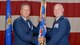 Maj. Gen. Randall Ogden, Fourth Air Force commander, hands the 507th Air Refueling Wing flag to Col. Richard Heaslip, 507th ARW commander, June 3, 2018, at Tinker Air Force Base, Okla. The passing of a flag during a change of command ceremony serves as a visual symbol of command to Airmen within the unit. (U.S. Air Force photo/Tech. Sgt. Samantha Mathison)