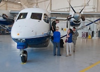 Local employers take turns viewing the interior of a C-145 Skytruck June 4, 2018 at Duke Field, Fla.