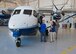 Local employers take turns viewing the interior of a C-145 Skytruck June 4, 2018 at Duke Field, Fla.
