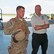 Staff Sgt. Dan Ordoqui, 919th Special Operations Security Forces Squadron, gives a unit mission overview to James Dicks,