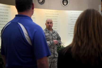 Lt. Col. Brooks Wilkerson speaks to volunteers during an orientation at Air Force Mortuary Affairs Operations.